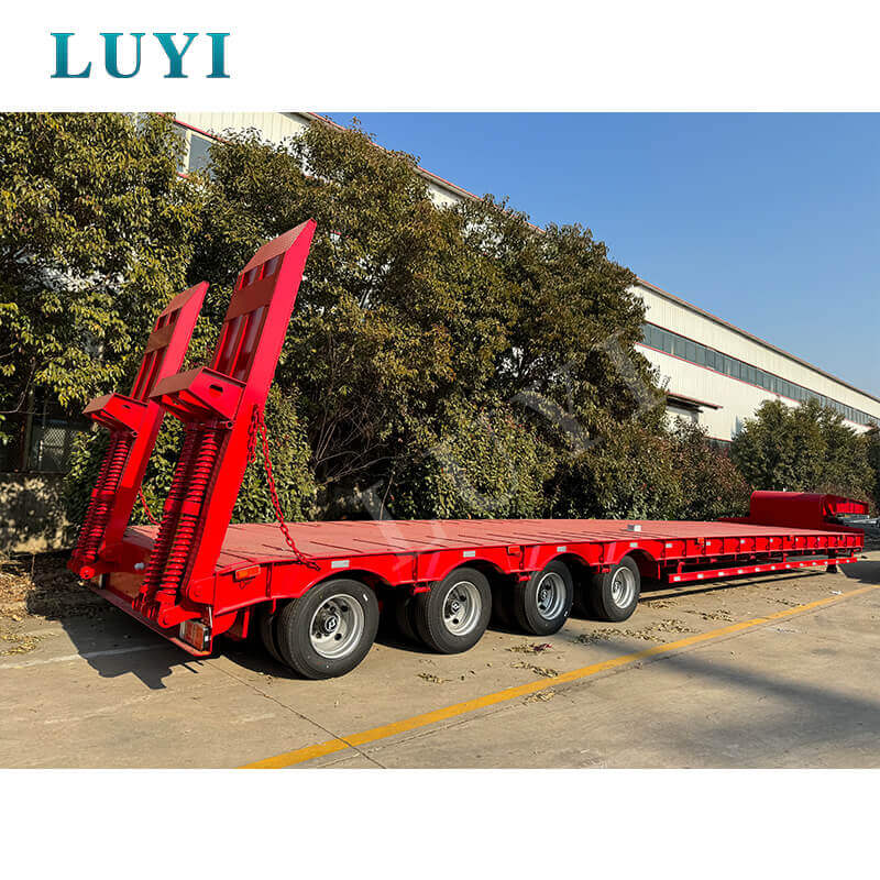 ตัวอย่างหนังคอห่านแบบถอดได้กับตัวอย่าง Lowboy: ไหนดีกว่าสำหรับการขนส่งเครื่องจักรกลหนัก?