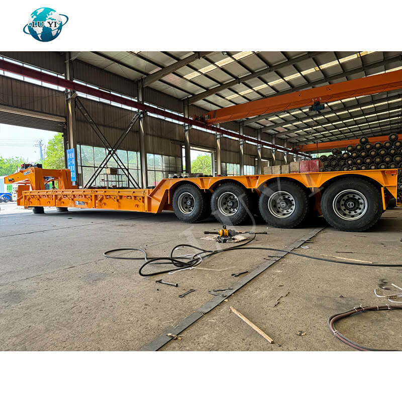 รถบรรทุกกึ่งพ่วงคอห่านต่ำ 4 เพลา 100 ตัน